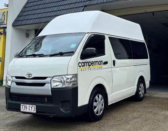 White Toyota HiAce high-top campervan with Camperman Australia branding.