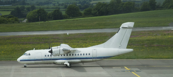 airplane at the runway of cork airport, ireland
