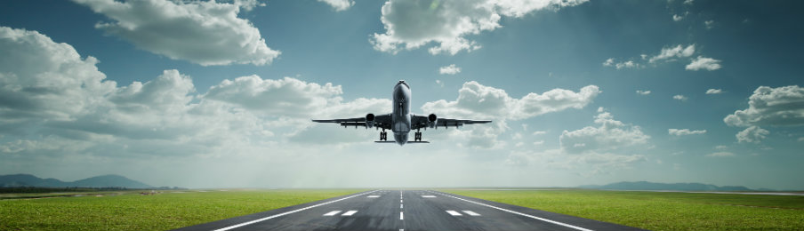 An airplane taking off from runway airport