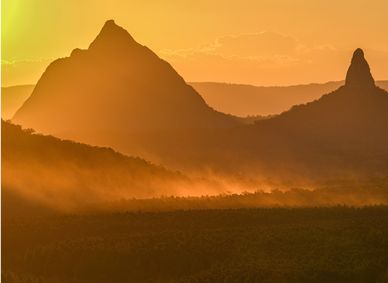 The Glasshouse Mountains in a beautiful light.