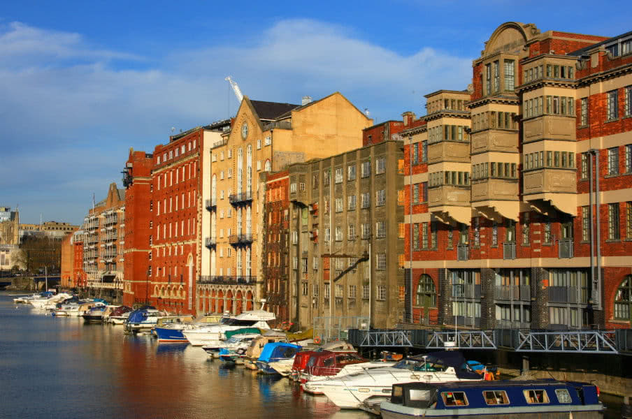 Bristol boats and buildings from Redcliffe bridge, UK