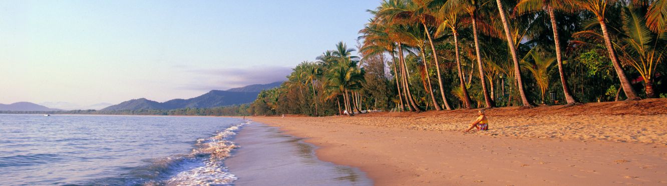 Beautiful Palm Cove lies just a 30 minute drive north of Cairns.