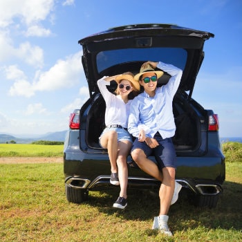 couple enjoying their long road trip
