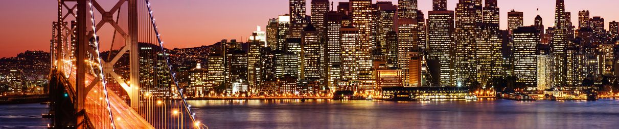San Francisco skyline and Bay Bridge at sunset