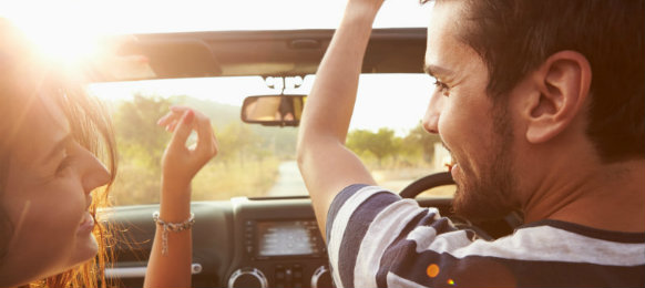 couple dancing while in the road trip