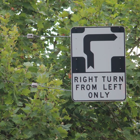 Right turn from left only sign in Melbourne, Australia.