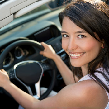 excited woman ready to explore rio with a car rental