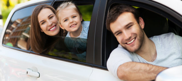 family riding a car hire