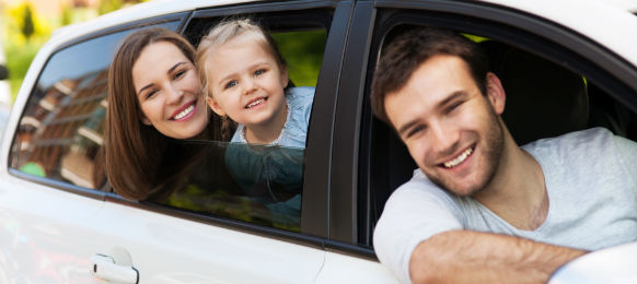 family inside a car hire