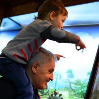grandfather and grandson at the museum