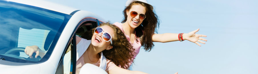two women enjoying their road trip in newark