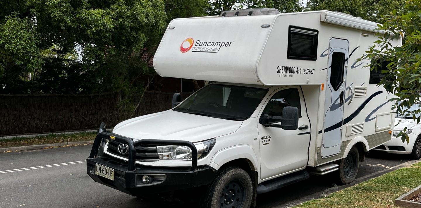 Relaxing by a Kombi van