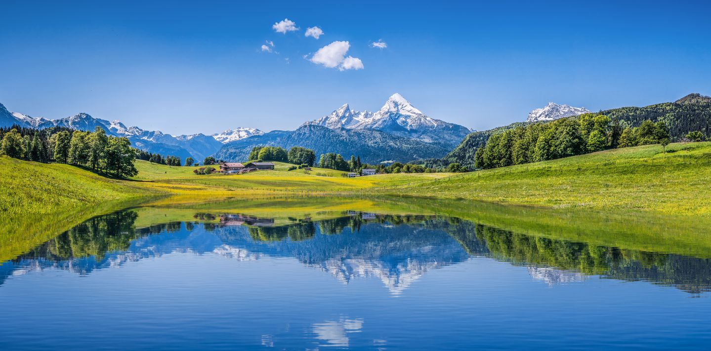 Idyllic summer landscape with clear mountain lake in the Alps.