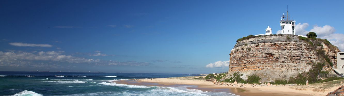Nobbys Lighthouse overlooking the beach in Newcastle.
