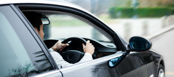 man driving in a car hire