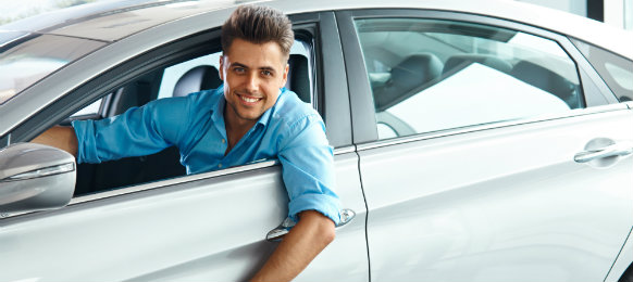 handsome some man inside the car