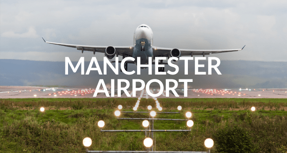 airplane taking off at manchester airport
