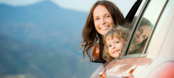 mother and daughter inside the car rental