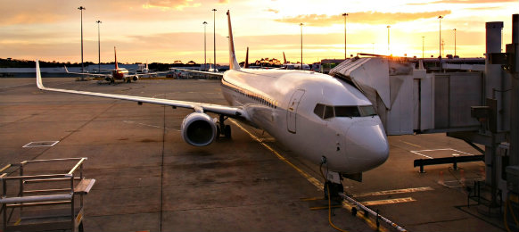 An airplane parked at the airport terminal