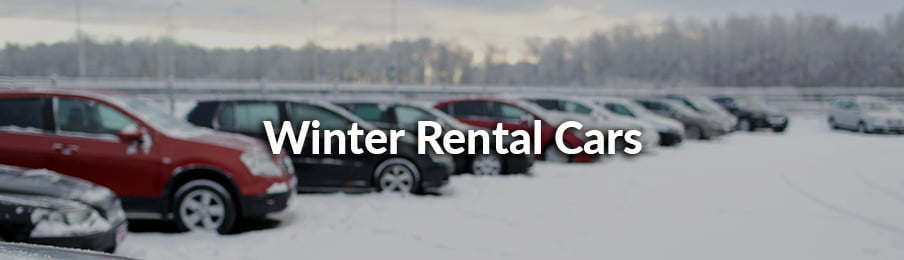 Rental cars parked at the parking area during winter season
