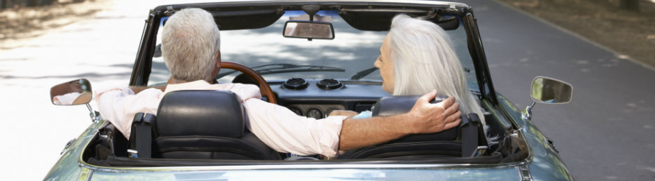 senior couple driving a car 