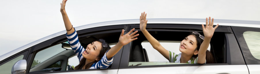 sisters enjoying their road trip