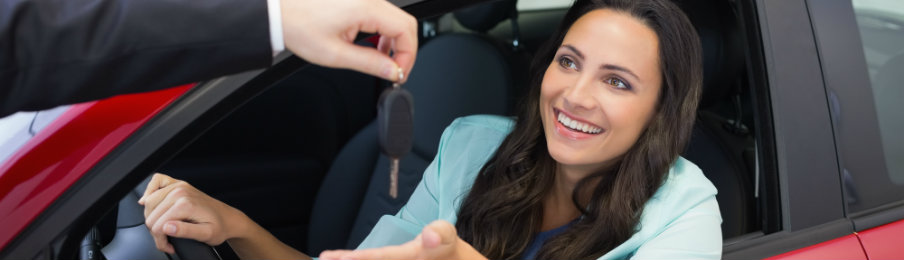 woman getting car key