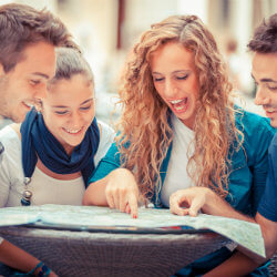 travelling friends looking at winchester map