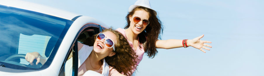two girls in a car rental