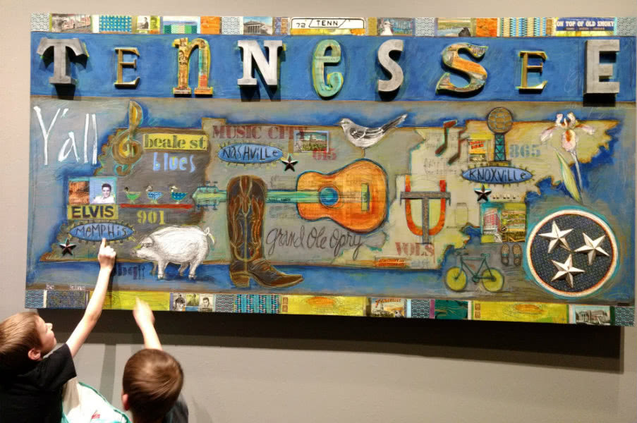 two kids enjoying checking map