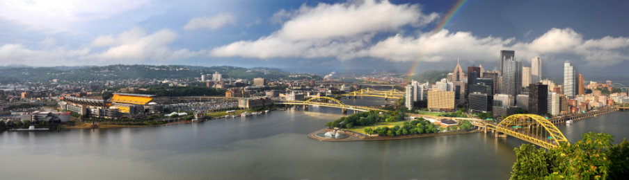 view of Pittsburgh with rainbow in late afternoon