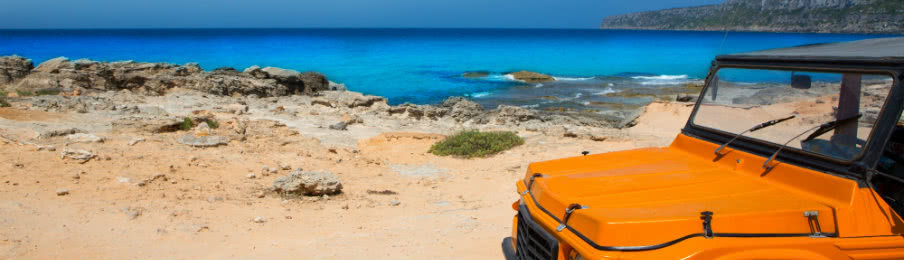 jeep parked at a seaside
