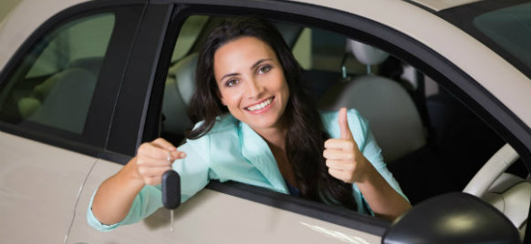 woman riding a car hire in ipswich railway station