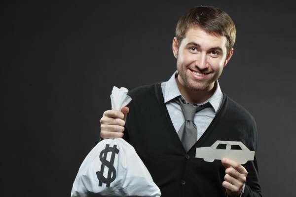 man-holding-money-and-car_000018109514Large