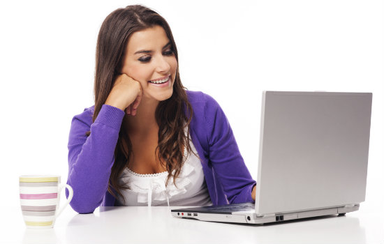 happy woman using the computer