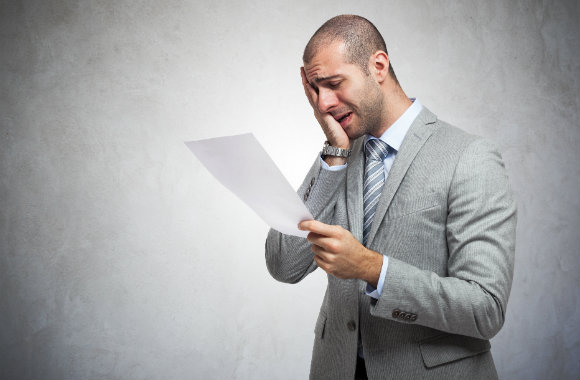 man-reading-an-invoice-dp