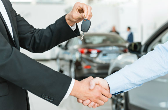 car-rental-company-congratulate-and-give-key-to-customer