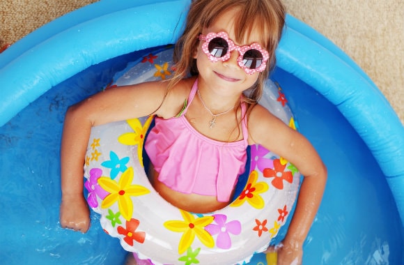Child Playing in Pool