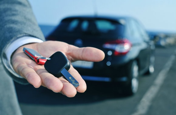 Handing Over the Keys of a Rental Car