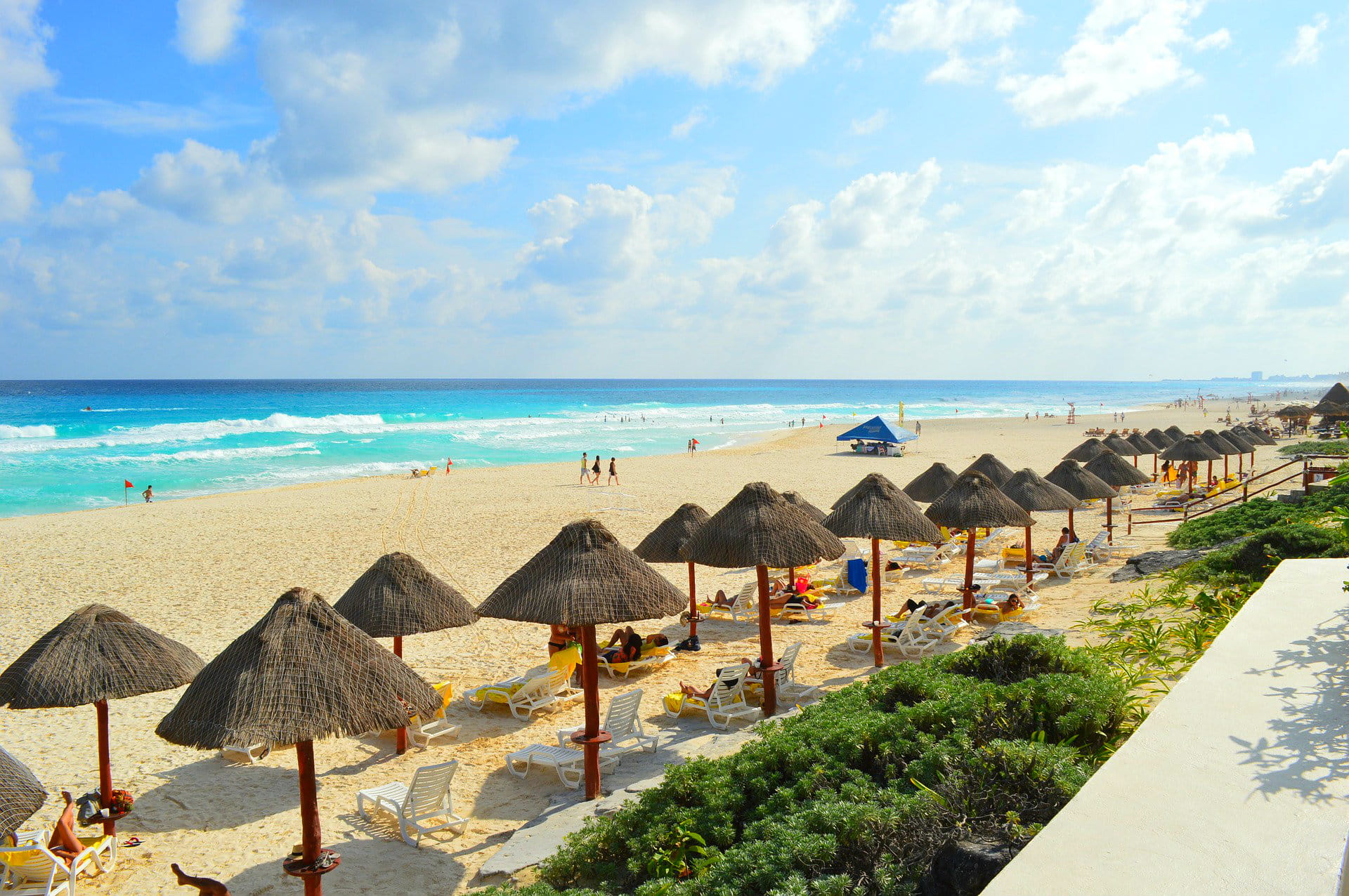 Swimming in the crystal-clear waters at Cancun