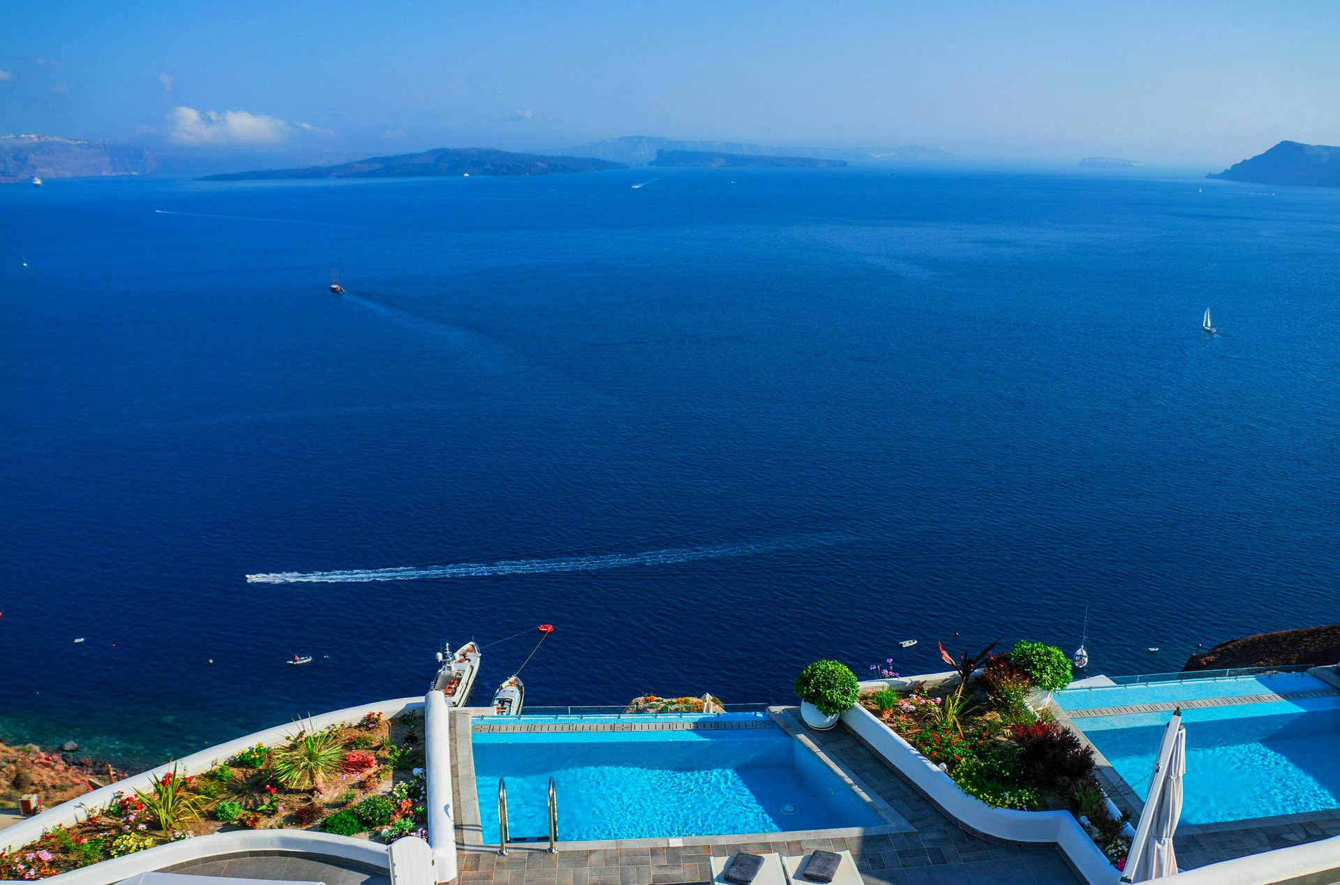Admiring the view from a luxury hotel in Santorini