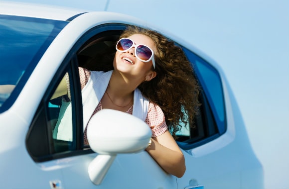 Young Driver in a Rental Car