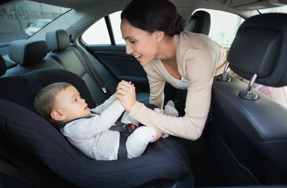 cute-baby-in-safety-car-hire-seat-dp