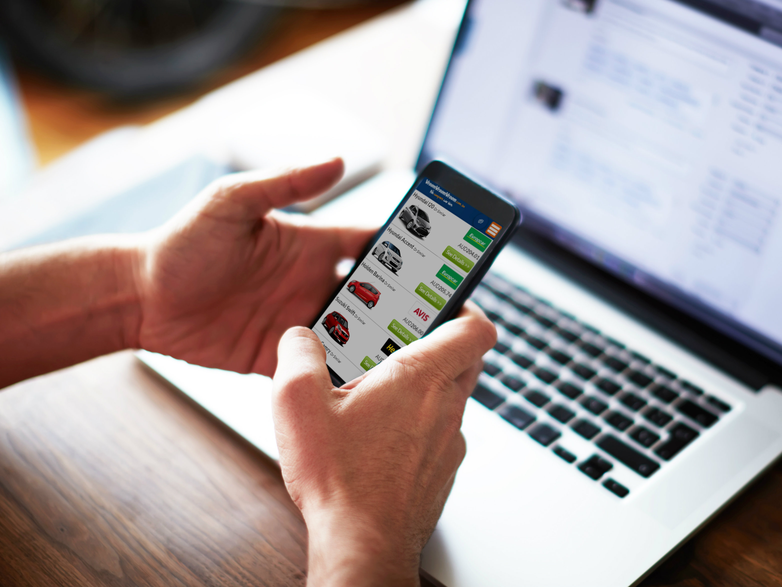 Man using the new VroomVroomVroom mobile app for android users
