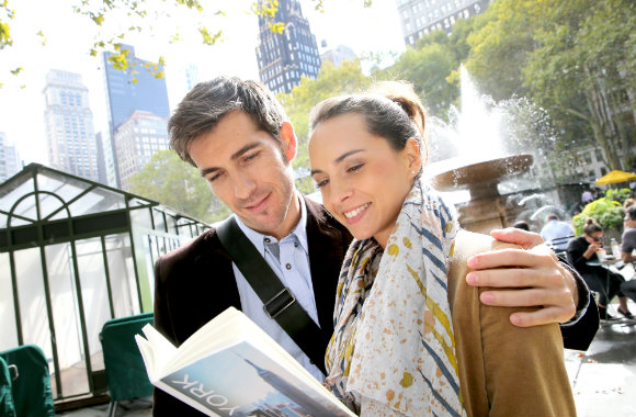 couple reading new york guide
